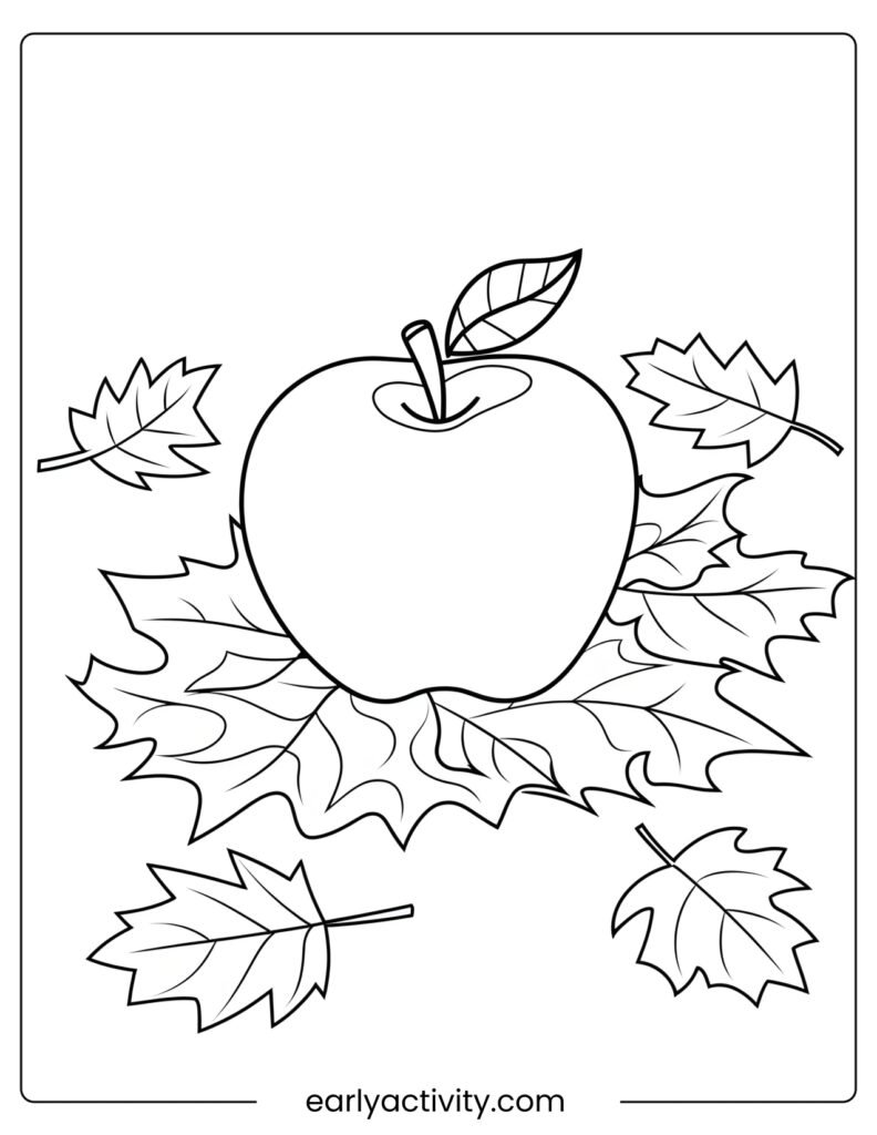 15Apple nestled Among Autumn Leaves on a Table